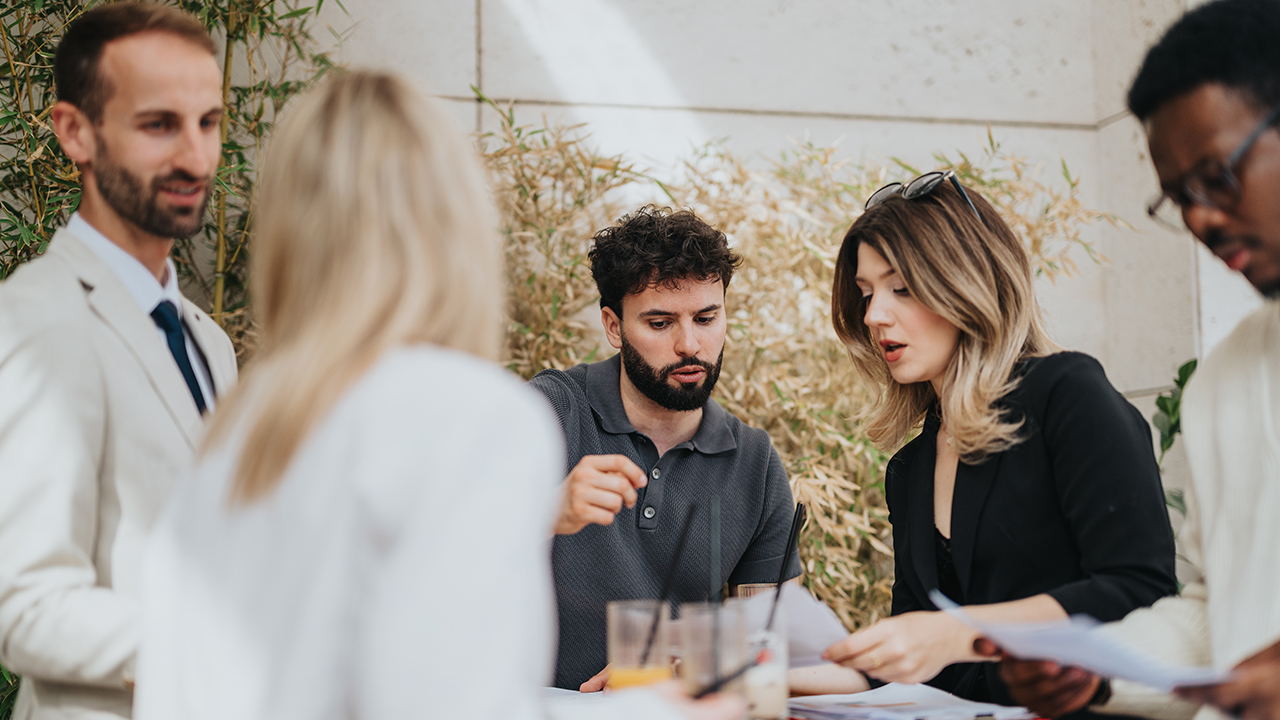 People working, image for Aprimo Case study for coResolute